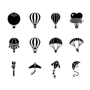Collection of black and white hot air balloon and kite icons