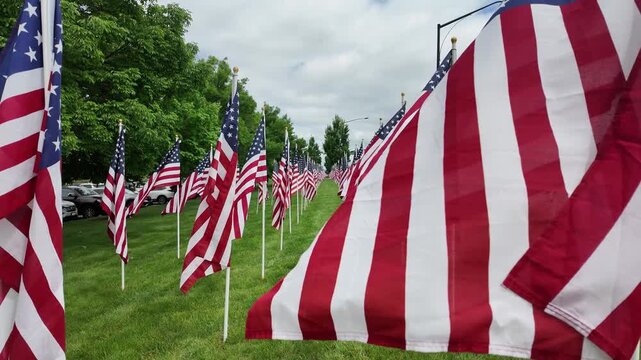 Gimbal shot of field of American flags in field in Westerville, Ohio