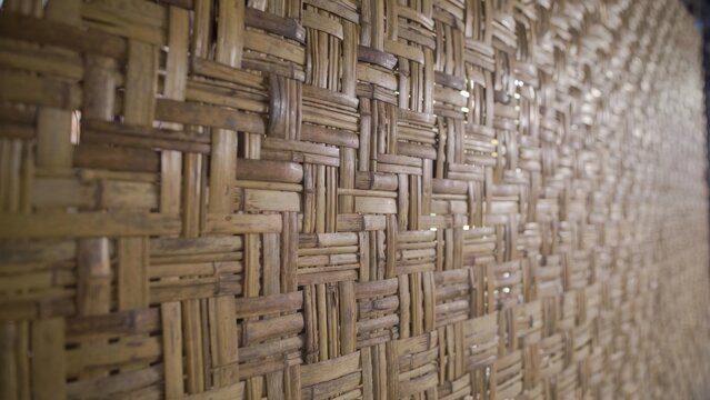Close up woven rattan square pattern on panel surface
