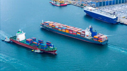 Obraz premium Commercial cargo container ships and a vehicle carrier vessel operating at a busy maritime port terminal. Global supply chain trade, ocean freight logistics, and harbor shipping hub.