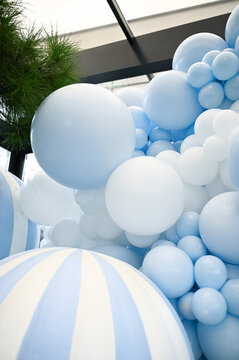 Blue and white balloons installation for event decor.