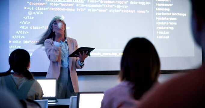 Woman, tablet and screen with students at college in classroom, remote and coding course for education. Person, IT professor and teaching with tech, learning and scroll for programming in university