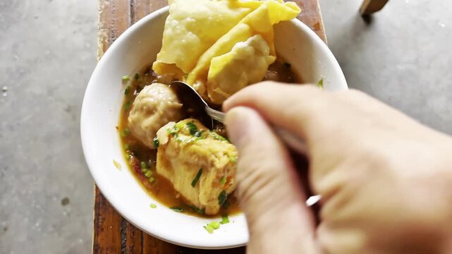 Bakso malang, Bakso Malang contains tofu, meatballs, and wonton crackers. Food. Indonesian food. Culinary. Street food.