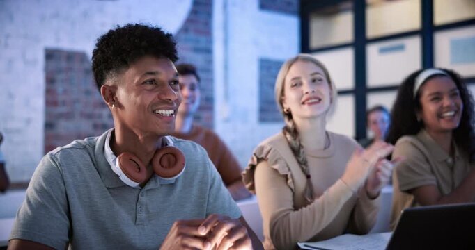 Applause, education and thank you with student man in classroom at university for achievement. Laughing, motivation and success with happy person at college for development or learning milestone