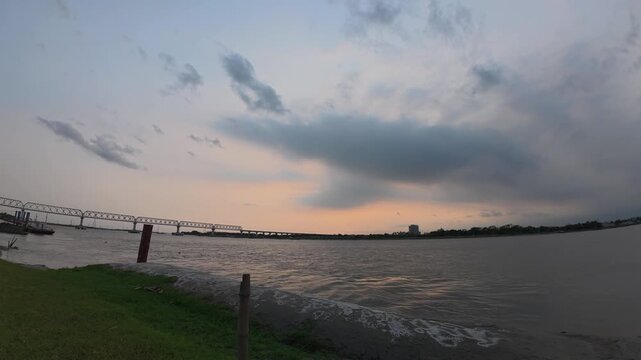 Long truss railway bridge crosses wide Rupsha River, Khulna Bangladesh