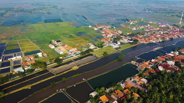 Aerial View of Fish Ponds and Rural Village in Indonesia