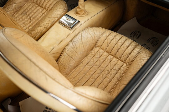 Lucerne, Switzerland, May 30, 2026. Vintage tan leather interior and seats of a classic sports car