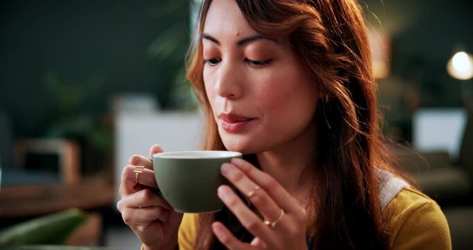 Coffee, blow and relax with woman in home for weekend break, thinking and self care. Mindfulness, peace and calm with person and hot cup in living room of apartment for drinking tea, mindset and rest