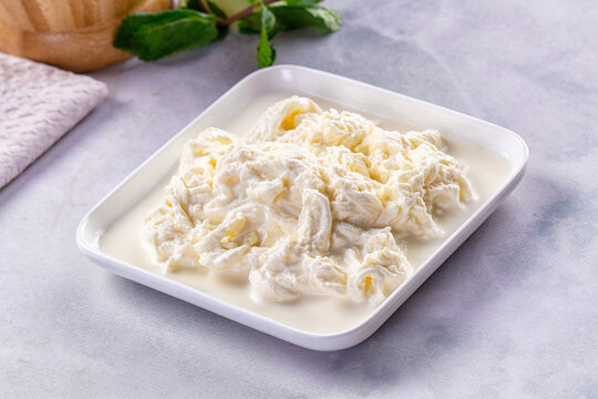 Italian soft young stracciatella cheese