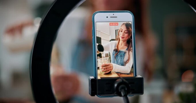 Woman, vlogger or phone screen with milkshake for nutrition, health or online tutorial. Female person, influencer or live recording with smartphone or ring light for diet tips, help or advice in home
