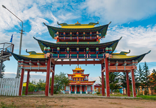 Colorful traditional Buddhist gate leading to the main temple at Ivolginsky Datsan on a sunny day