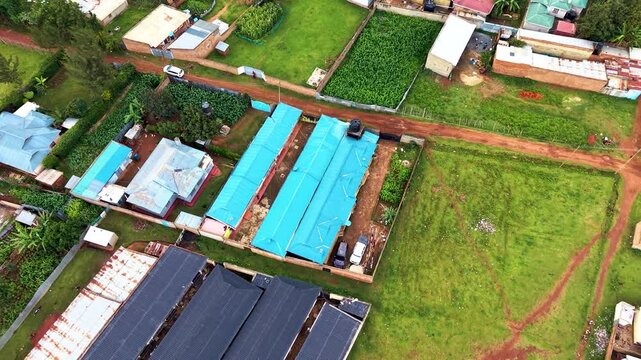 Aerial drone view of rural roads in kenya, Rural roads village poverty slums northern kenya