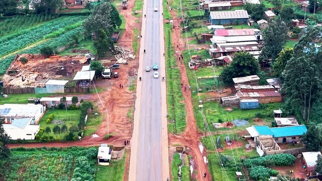 Aerial drone view of rural roads in kenya, Rural roads village poverty slums northern kenya