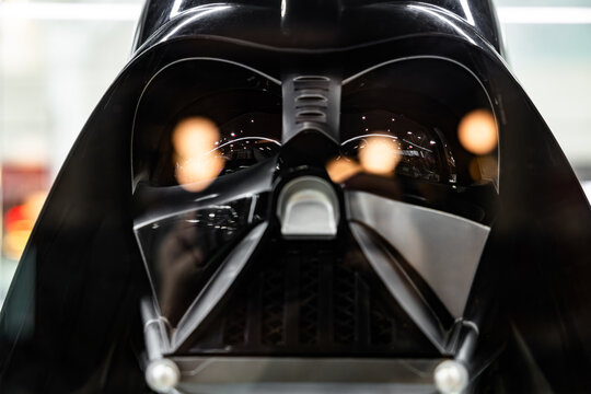 Darth Vader black helmet macro view with light reflections in mask lenses