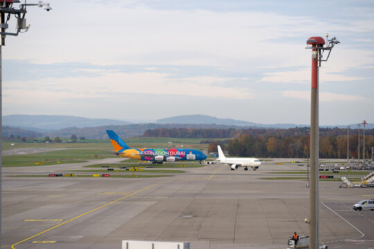 Emirates passenger airplane Airbus A380-861 registration A6-EEW pushback at Swiss Z&uuml;rich Airport on an autumn day. Photo taken October 31st, 2025, Zurich Airport, Switzerland.