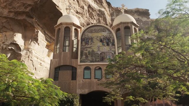 Cave Church, Monastery of Saint Simeon the Shoemaker with Mount Mokattam in background in Cairo