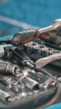 Set of tools in open suitcase used for repair