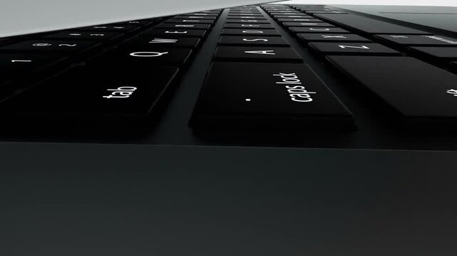 Modern silver laptop opening up, showing close-up of keyboard and trackpad in a clean 3D animation.