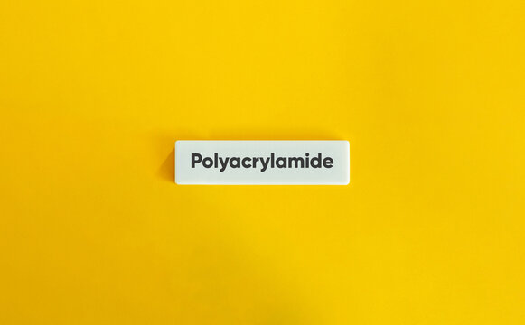 Polyacrylamide Chemical Ingredient Text on a White Block Against a Bright Yellow Background