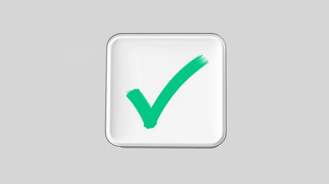 Static close up shot of glossy square button receiving green check mark being drawn on neutral gray background in studio
