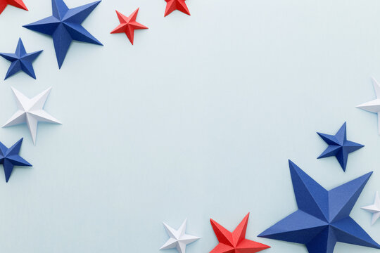 Red, white and blue origami paper stars on a light blue background with large copy space, ideal for patriotic advertising, holiday promotions, greeting cards, invitations, banners posters social media