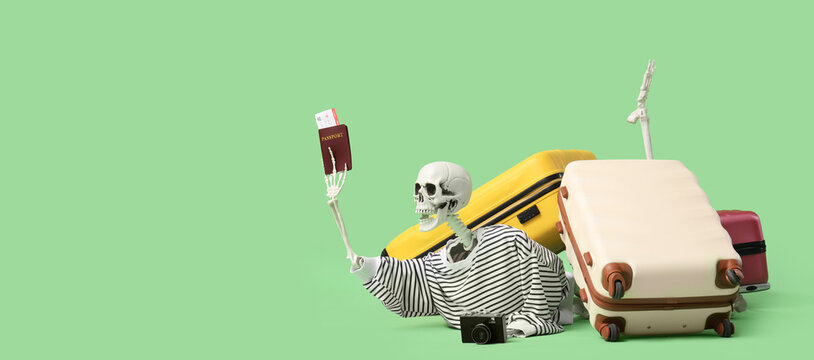 Human skeleton with passport lying under suitcases on green background. Travel concept