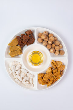 Top view flat lay of Central Asian traditional sweets and kurt cheese