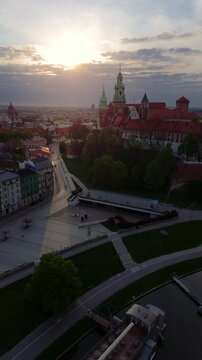 An aerial flyover of Wawel Castle in Krakow at dawn on a spring morning.