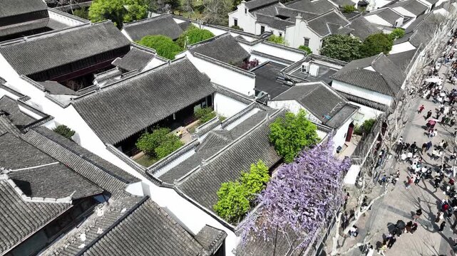 Aerial panoramic view of Jiangsu ancient town with winding canals in China