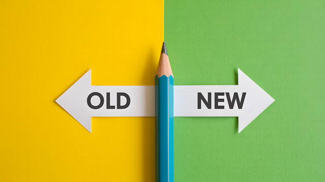A blue pencil lies on a yellow and green background with old and new arrows
