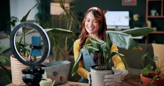 Live stream, plants and woman in home and talking for advice, botany tips and floral care for vlog. Influencer, content creator and person record with ring light for hobby, gardening and social media