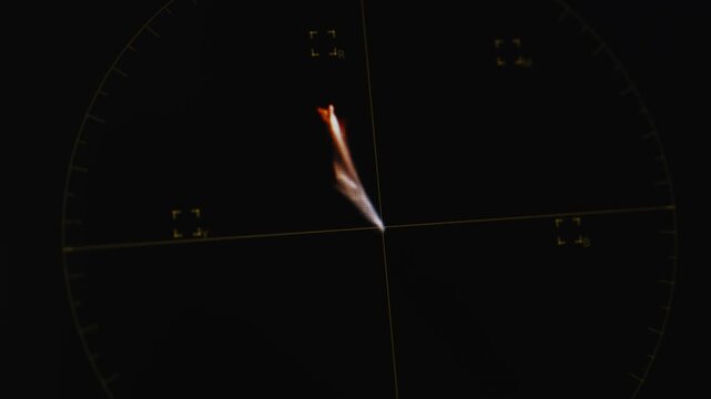A close-up shot of a digital color vectorscope monitor screen