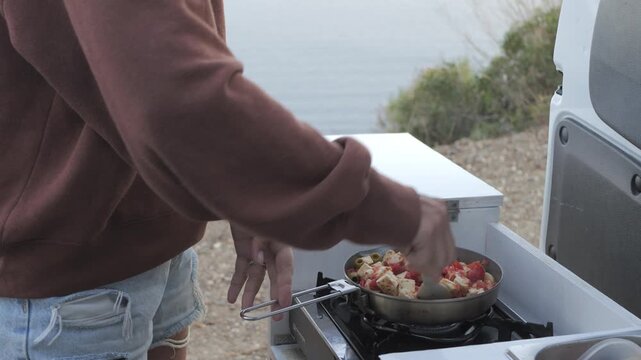 Cooking dinner with Mediterranean sea view, van life, Elba, Italy