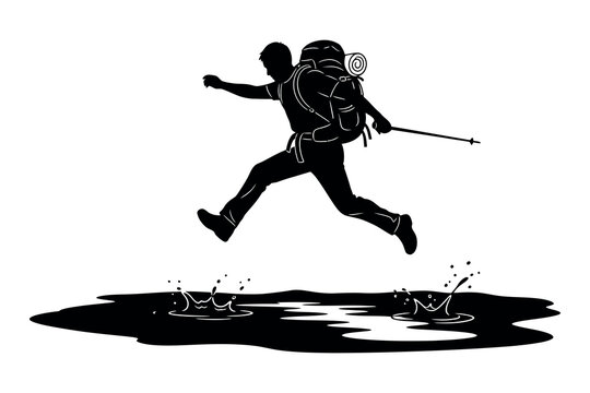 Silhouette of a hiker leaping over a puddle with a backpack and trekking pole in motion
