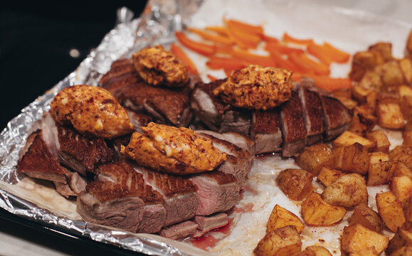 baked duck with potatoes and butter