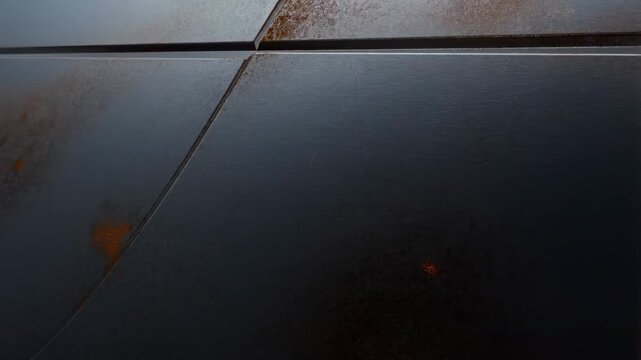 Rust appearance and progression on metal surface in timelapse sequence