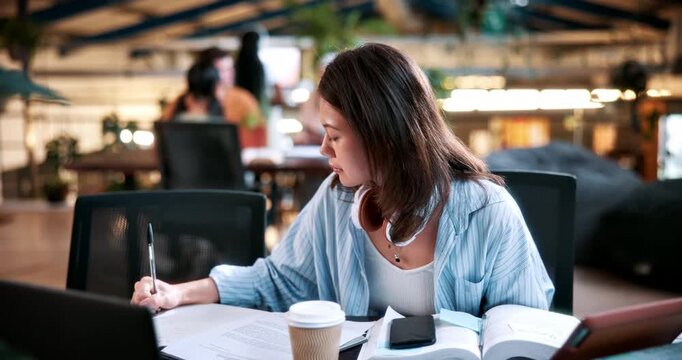 Writing, student and woman with notebook in library, exam preparation and studying for test knowledge. Education, learning and university scholar with revision for assessment, tech and course essay