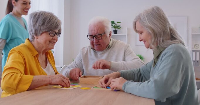 Board games group fun, activities for elderly with nurse, caregiver, carer or support worker, hobby ideas for active seniors, social recreational events, friendship club in retirement house, retired