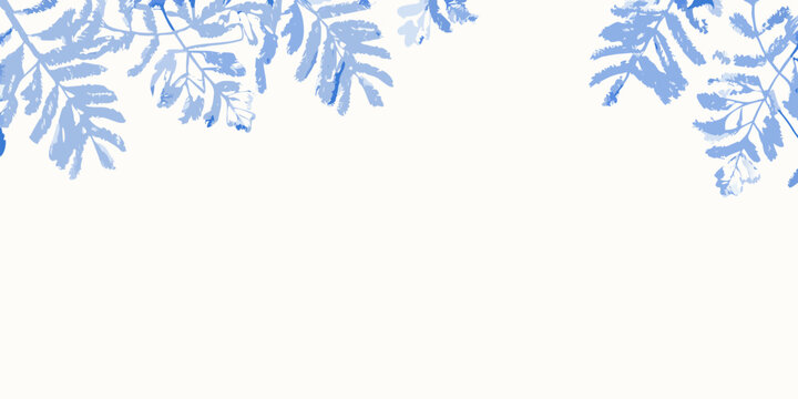 Blue fern leaf pattern on a cream colored background