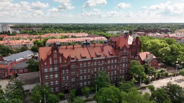 Aerial view of residential district with red brick buildings and tenement houses in Wrocław Poland