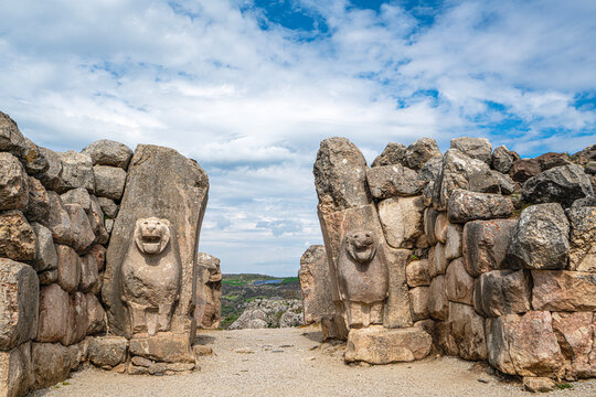 Architectural view of the famous stone-carved Lion Gate at the ancient ruins of Hattusa. The monumental gate represents the master masonry and artistic achievements of the Hittite civilization in Anat