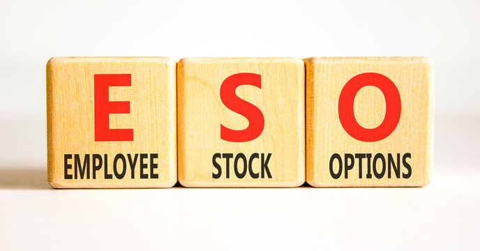 ESO employee stock options symbol. Concept words ESO employee stock options on beautiful wooden blocks. Beautiful white background. Business ESO employee stock options concept. Copy space.