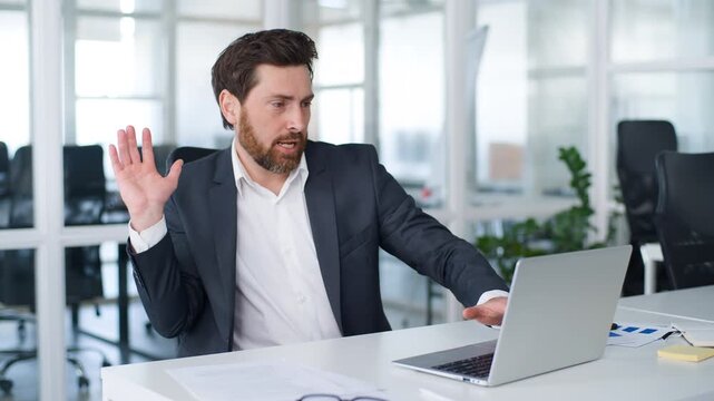 Funny successful Caucasian mature business man signing document dancing singing song listening music with laptop middle-aged businessman 40s male company CEO write in paper happy dance at office table