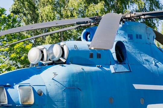 Side view of a heavy load utility helicopter fuselage structure highlighting regional security asset tracking, defense industry supply, and military aviation