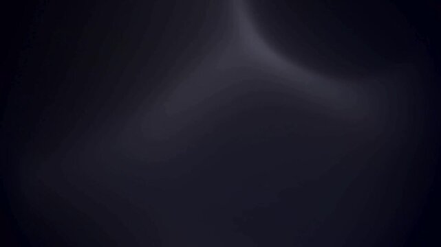 Smooth abstract dark grey loop background with soft white smoky wave movements and subtle organic light leaks, perfect for cinematic overlays or elegant transitions.