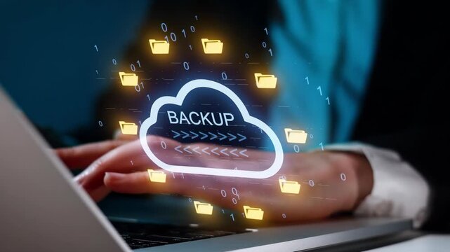 Cloud backup process shown on a laptop screen with digital folders and data transfer symbols during an office work session