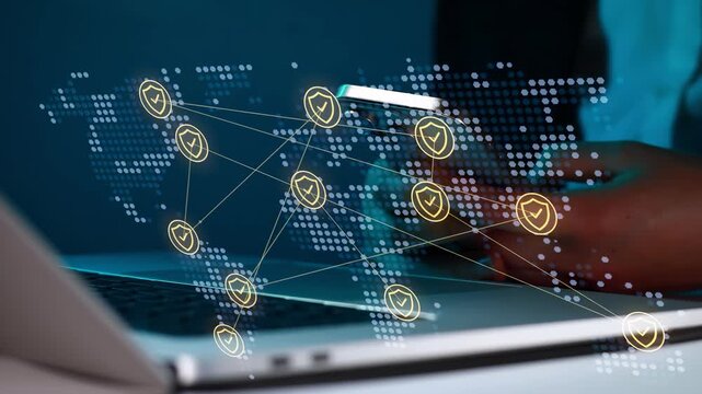 Network security and online safety practices during a digital session with a laptop and smartphone in a technology workspace