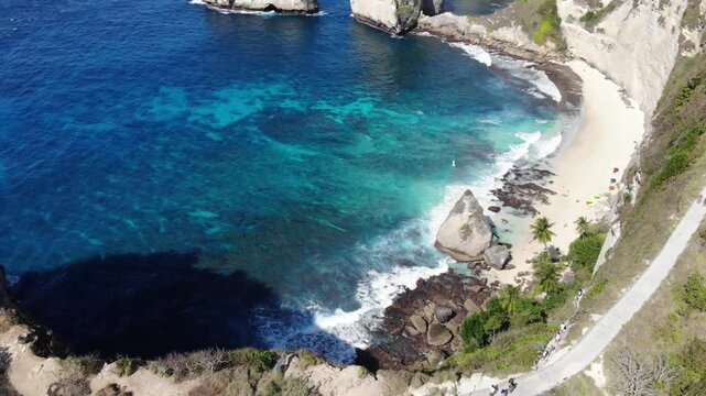 Aerial drone reveal over clifftop exposing Diamond Beach &ndash; Nusa Penida, Bali, Indonesia
