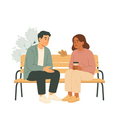 Obraz premium A man and woman sitting on a park bench, having a conversation and holding a cup of coffee.