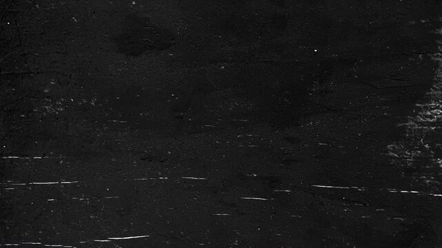 Dark Grunge Scratch Texture Background with Distressed Surface, Rough Black Wall Pattern and Cinematic Motion Graphics Animation Loop